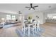 Open-concept dining area connects to the living room and kitchen, offering ample space at 5125 Palm Aire Dr, Sarasota, FL 34243