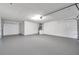 Clean and spacious two-car garage with ample room for storage and parking at 5125 Palm Aire Dr, Sarasota, FL 34243