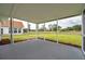 Relaxing screened porch offering views of the backyard and landscaped surroundings at 5125 Palm Aire Dr, Sarasota, FL 34243