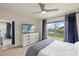 Bedroom offering a water view, large dresser and access to a sitting room at 5358 Shell Mound Cir, Punta Gorda, FL 33982