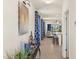 Bright entryway with decor and neutral color palette, leading to the living area, creating an inviting atmosphere at 5358 Shell Mound Cir, Punta Gorda, FL 33982