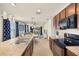Open kitchen with a view into the living area features stainless steel appliances and a dining area at 5358 Shell Mound Cir, Punta Gorda, FL 33982