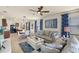 Spacious living room connected to kitchen and dining with comfortable seating and stylish decor at 5358 Shell Mound Cir, Punta Gorda, FL 33982