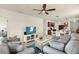 Inviting living room flows into kitchen and dining areas, complete with a media center and comfortable seating at 5358 Shell Mound Cir, Punta Gorda, FL 33982