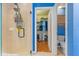 Main bathroom featuring a tiled shower, a closet, and a toilet in a separate room for convenience at 5618 Sheer Bliss Loop, Land O Lakes, FL 34639