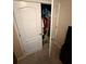 Bedroom closet with clothes and personal items at 6121 35Th E Ct, Bradenton, FL 34203