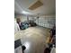 A two car garage provides ample space for vehicles and storage of various household items and equipment at 6121 35Th E Ct, Bradenton, FL 34203