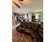 Spacious kitchen featuring stainless steel appliances, island seating, and an adjacent cozy dining area at 6121 35Th E Ct, Bradenton, FL 34203