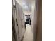 Large walk-in closet provides ample storage for clothes, shoes, and accessories at 6121 35Th E Ct, Bradenton, FL 34203