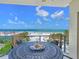 Relaxing balcony with seating overlooking the beach, perfect for enjoying ocean views at 6512 Midnight Pass Rd # 301, Sarasota, FL 34242