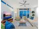 Bright living room with stylish white sofas, modern decor, and ocean view at 6512 Midnight Pass Rd # 301, Sarasota, FL 34242