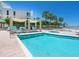 Community pool with lounge seating and tropical landscaping at 6512 Midnight Pass Rd # 301, Sarasota, FL 34242