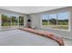 Bright bedroom features large windows with scenic views at 7160 Myakka Valley Trl, Sarasota, FL 34241