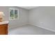 Inviting bedroom with neutral tones and a large window providing ample natural light at 7160 Myakka Valley Trl, Sarasota, FL 34241