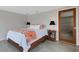 Comfortable bedroom with wood accents and lots of natural light at 7160 Myakka Valley Trl, Sarasota, FL 34241