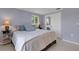 Comfortable bedroom featuring a mirrored closet and soft, neutral colors throughout at 7160 Myakka Valley Trl, Sarasota, FL 34241
