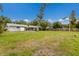 Large backyard and covered patio at 7803 2Nd W Ave, Bradenton, FL 34209