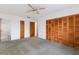 Bedroom featuring neutral wall color and two closets at 7803 2Nd W Ave, Bradenton, FL 34209