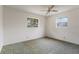 Bedroom featuring neutral wall color and two windows allowing ample natural light at 7803 2Nd W Ave, Bradenton, FL 34209