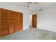 Bedroom featuring neutral wall color and wooden closet at 7803 2Nd W Ave, Bradenton, FL 34209