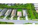 An aerial view of a single Gathering home in a well-manicured community at 8077 Sandstar Way, Sarasota, FL 34240