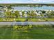 Enjoy the view of Imperial Lakes as you enter the neighborhood at 8531 Imperial Cir, Palmetto, FL 34221