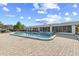 Large community pool with a spacious deck and plenty of seating at 8531 Imperial Cir, Palmetto, FL 34221