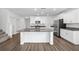Modern kitchen featuring stainless steel appliances, granite countertops and large kitchen island at 8656 40Th E Cir, Palmetto, FL 34221