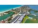 Condos and beach homes are located near white sand beaches and clear turquoise waters at 8897 Midnight Pass Rd # 407, Sarasota, FL 34242
