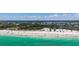 Scenic aerial beach view showcasing condos by the water with access to tranquil beaches, ideal for coastal living at 8897 Midnight Pass Rd # 407, Sarasota, FL 34242