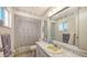 Full bathroom featuring shower/tub combo with shower curtain, vanity and toilet at 8897 Midnight Pass Rd # 407, Sarasota, FL 34242
