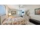 Inviting bedroom with twin beds, ample natural light, and a calming color scheme at 8897 Midnight Pass Rd # 407, Sarasota, FL 34242