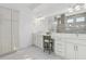 Modern bathroom boasts double sinks, a large mirror, and an abundance of counter and storage space at 8982 Baroque Ter, Sarasota, FL 34240