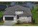 Beautiful one-story home featuring a well-manicured lawn, tile roof, and a two-car garage at 8982 Baroque Ter, Sarasota, FL 34240