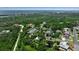 Beautiful aerial view of home near the ocean with lush green landscaping at 951 Varet Rd, Venice, FL 34293