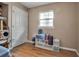 Bright bedroom with hardwood floors and window for natural light at 951 Varet Rd, Venice, FL 34293