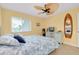 Bedroom featuring a coastal theme, bright colors and unique décor to make the perfect relaxation spot at 1001 Point Of Rocks Rd # 207, Sarasota, FL 34242