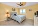 Bright bedroom with tropical décor, featuring a comfortable bed and charming details creating a cozy ambiance at 1001 Point Of Rocks Rd # 207, Sarasota, FL 34242