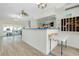 Bright lobby area with tiled floors, ceiling fans and mail boxes near windows at 1001 Point Of Rocks Rd # 207, Sarasota, FL 34242