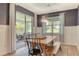 Open dining area featuring wood table and backyard patio access, perfect for dining al fresco at 11502 Golden Bay Pl, Bradenton, FL 34211