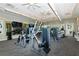 Well-equipped fitness center with modern machines and mirrored walls offers a great workout space at 11502 Golden Bay Pl, Bradenton, FL 34211
