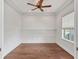 Bright office space with wood floors, white walls, and wainscoting at 11714 Forest Park Cir, Bradenton, FL 34211
