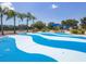 Community splash pad with shaded seating and colorful design elements at 11714 Forest Park Cir, Bradenton, FL 34211