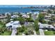 Gorgeous aerial view of waterfront homes with landscaped lawns and city view at 1387 Harbor Dr, Sarasota, FL 34239