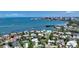 Scenic aerial view featuring beautiful waterfront homes with lush landscaping and city views at 1387 Harbor Dr, Sarasota, FL 34239
