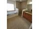 Bright bathroom with a separate shower and a tub beside a window at 1422 Jakway Rd, North Port, FL 34288