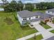 An aerial view of a two-story home with a big yard and a 2 car garage in a nice community at 14787 Gallop Run Dr, Lithia, FL 33547