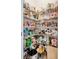 Pantry with wire shelving, canned goods, and a variety of food items at 14787 Gallop Run Dr, Lithia, FL 33547