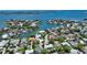 Aerial view of a luxurious home located near waterfront with city skyline views at 1607 Flower Dr, Sarasota, FL 34239