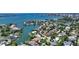 Aerial view showcasing waterfront property and neighborhood, with the featured home circled at 1607 Flower Dr, Sarasota, FL 34239